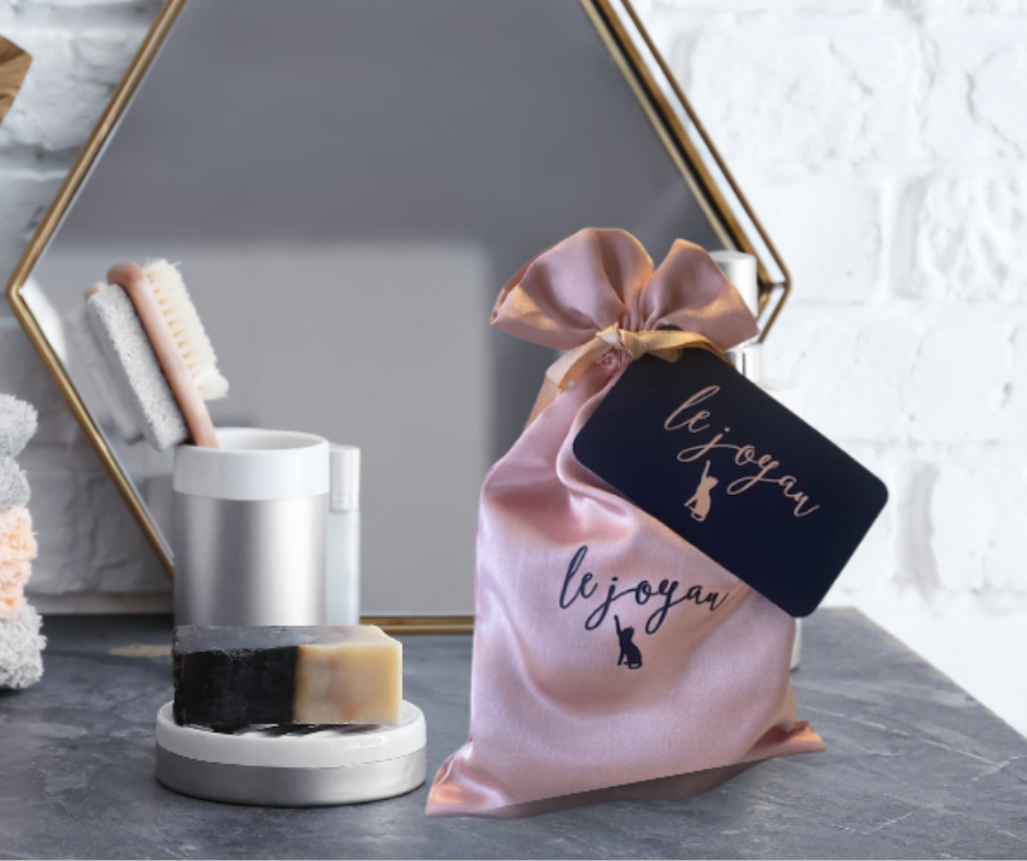 Le Joyau Luxe Packaging on bathroom countertop.