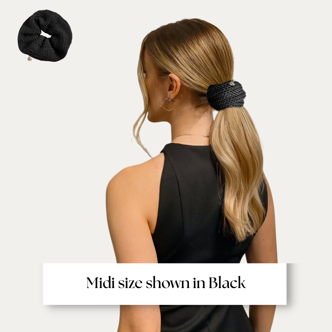 Midi size scrunchie shown on model in black dress on light grey background.