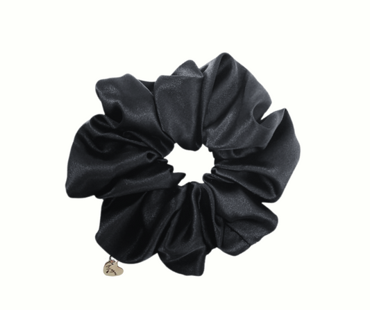 onyx colored silk scrunchie with heart charm on white background