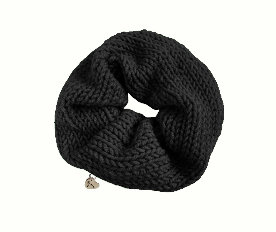 black knit scrunchie with heart charm on white background