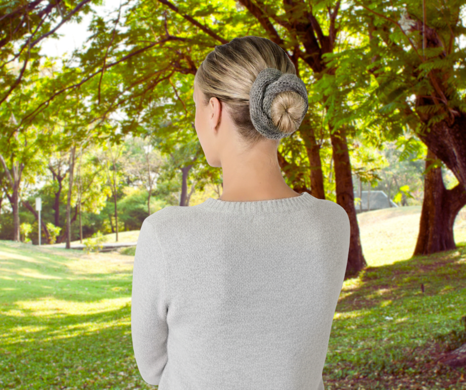 knit grey rustic scrunchie on model in light grey sweater.