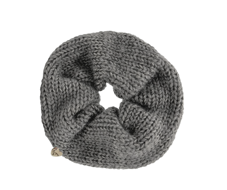 Knit wool scrunchie in rustic grey on white background.
