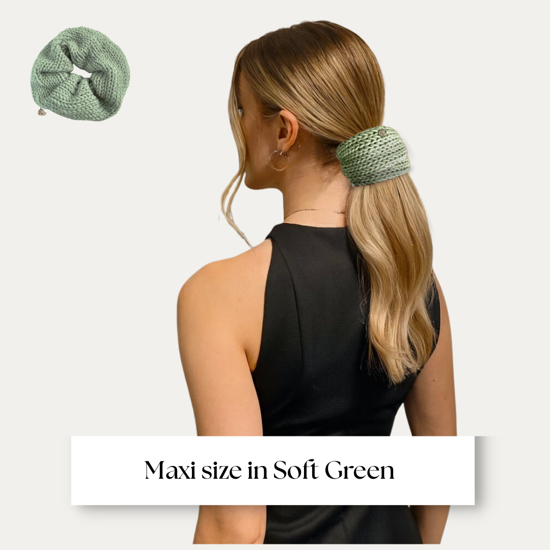 Maxi size scrunchie shown on model in black dress on light grey background.