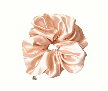 Presecco colored silk scrunchie on white background