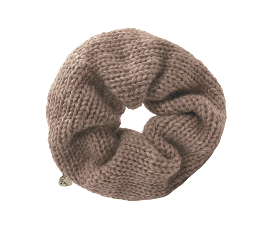 Knitted brown scrunchie on a white background