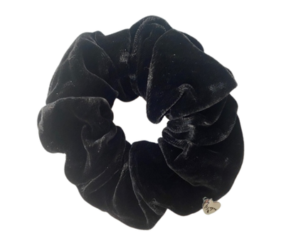 Black silk velvet scrunchie on a white background
