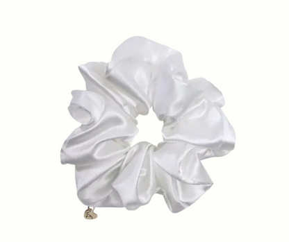 milk white silk scrunchie on a white background