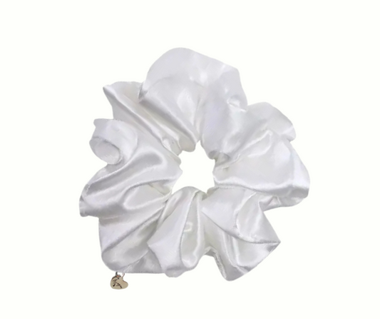 milk white silk scrunchie on a white background